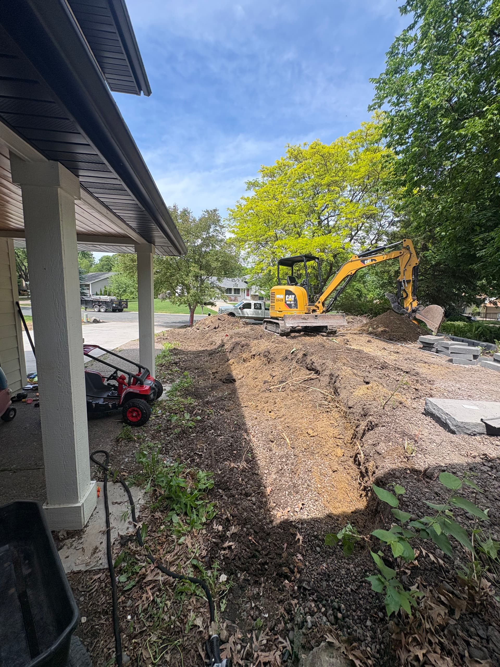 Front Yard Retaining Wall Excavation Built for a Future Patio image