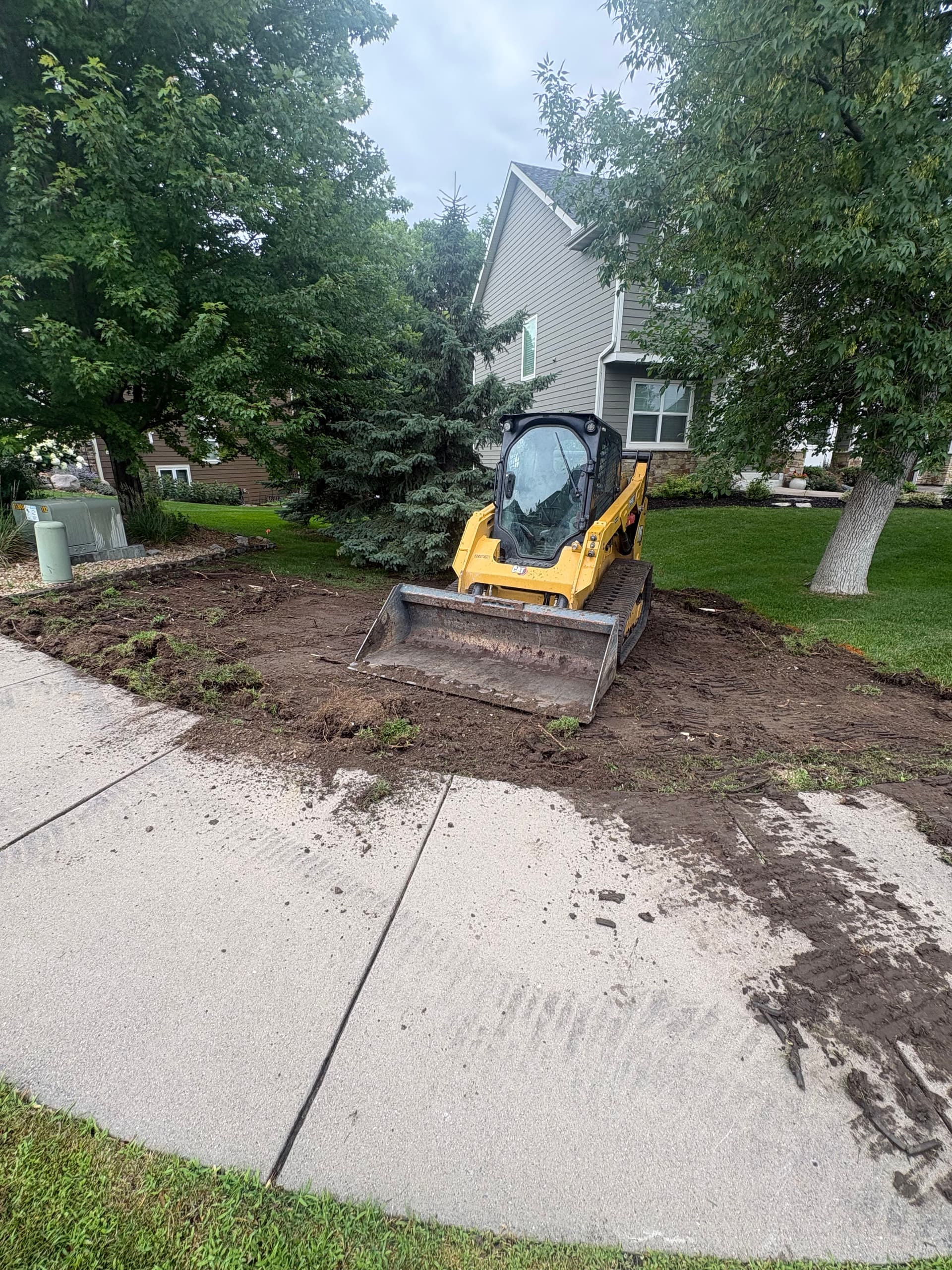 Tearing Out Old Grass and Starting Fresh With New Sod image