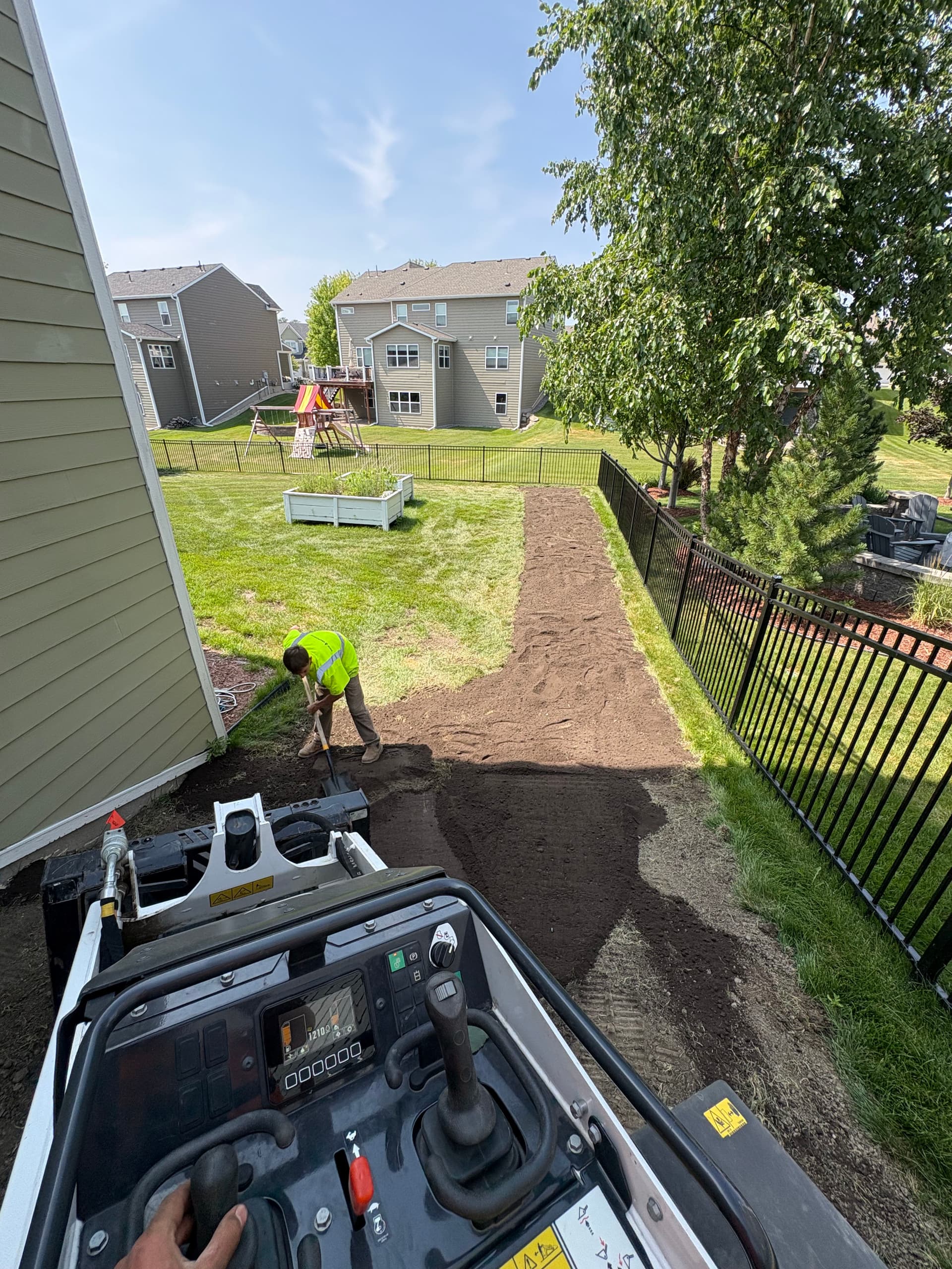 Topsoil and Erosion Matting to Stop Washout Before It Starts image
